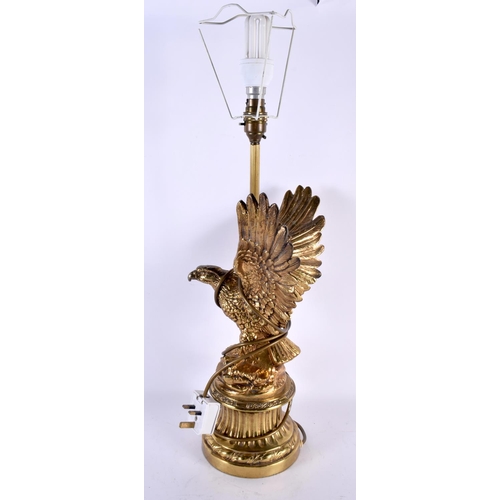 730 - A LARGE EARLY 20TH CENTURY POLISHED BRONZE TABLE LAMP formed as an eagle. 58 cm high.