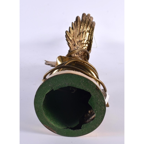 730 - A LARGE EARLY 20TH CENTURY POLISHED BRONZE TABLE LAMP formed as an eagle. 58 cm high.