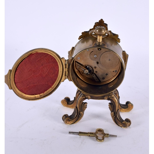 735 - AN EARLY 19TH CENTURY FRENCH E DREYFOUS BRONZE MANTEL CLOCK of scrolling rococo form. 14cm high.