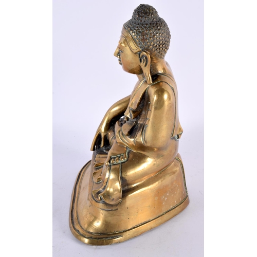 736 - A LARGE 19TH CENTURY INDIAN BRONZE FIGURE OF A BUDDHA modelled upon a triangular base. 24 cm high.