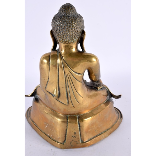 736 - A LARGE 19TH CENTURY INDIAN BRONZE FIGURE OF A BUDDHA modelled upon a triangular base. 24 cm high.