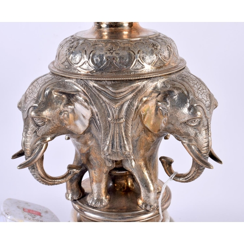 740 - A RARE LATE VICTORIAN/EDWARDIAN SILVER PLATED ELEPHANT COUNTRY HOUSE LAMP modelled upon a rococo bas... 