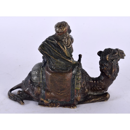 751 - AN 19TH CENTURY AUSTRIAN COLD PAINTED BRONZE ARAB GROUP modelled as a male upon a camel. 14cm x 9 cm... 