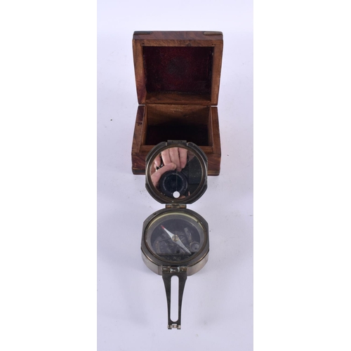 755 - A BOXED STANLEY INSTRUMENT together with a Troughton & Simms C1903 military compass. Largest extende... 