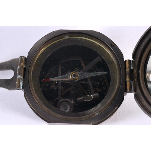 755 - A BOXED STANLEY INSTRUMENT together with a Troughton & Simms C1903 military compass. Largest extende... 