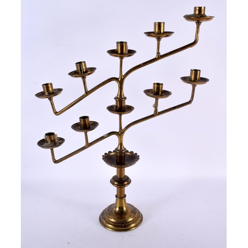 760 - A VINTAGE JEWISH BRASS MENORAH. 46 cm x 28cm.