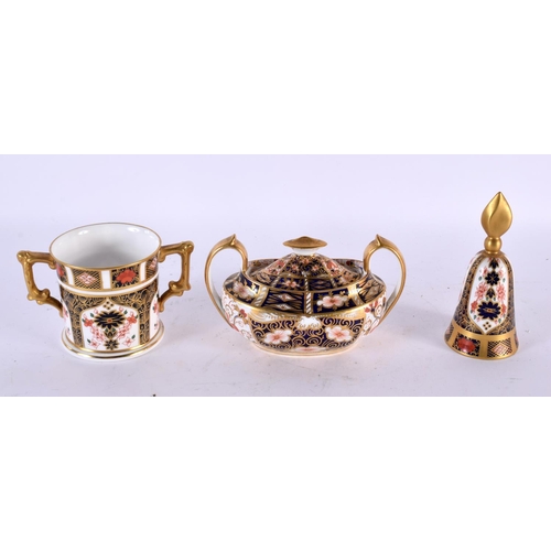 763 - A ROYAL CROWN DERBY CANDLE SNUFFER together with a mug & sucrier. Largest 13 cm wide. (3)