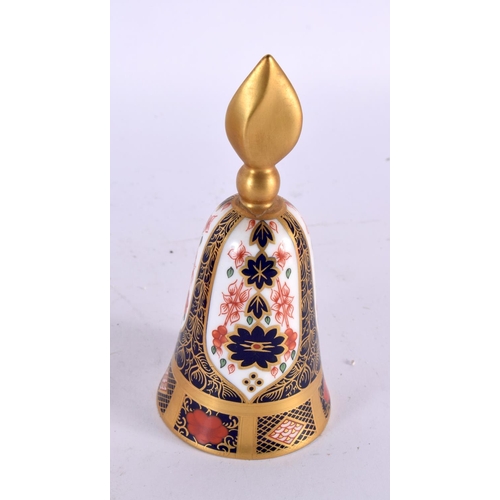 763 - A ROYAL CROWN DERBY CANDLE SNUFFER together with a mug & sucrier. Largest 13 cm wide. (3)