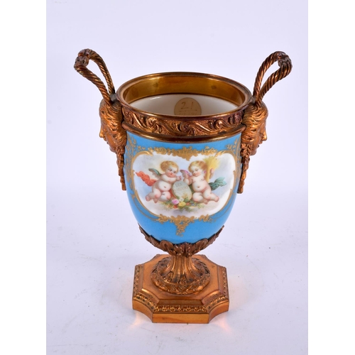 764 - A 19TH CENTURY FRENCH SEVRES PORCELAIN TWIN HANDLED VASE painted with putti. 23 cm high.