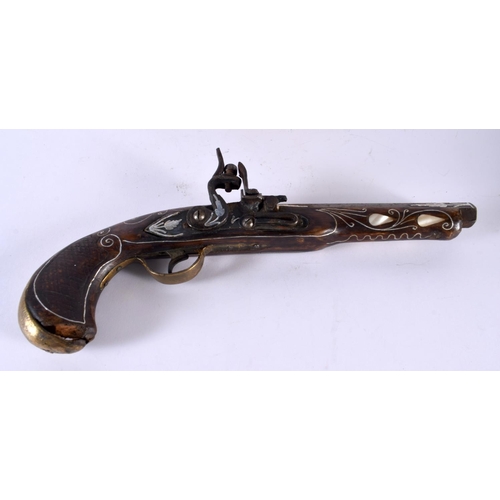 768 - A TURKISH MOTHER OF PEARL INLAID PISTOL together with a Middle Eastern bronze teapot and cover. Larg... 