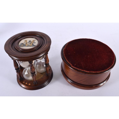 773 - AN EDWARDIAN TREEN SAND TIMER together with a similar mahogany box. Largest 16 cm diameter. (2)