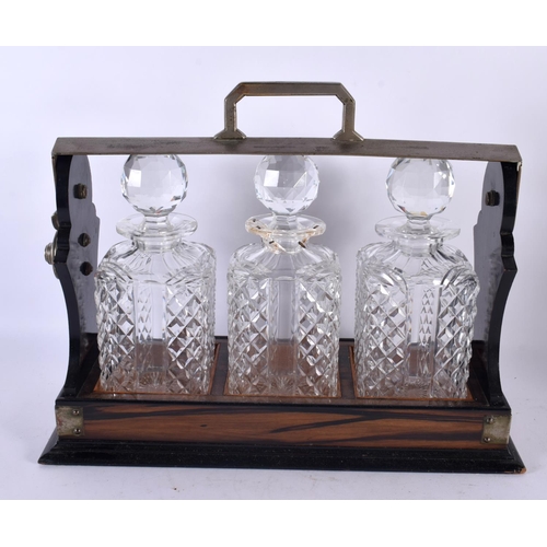 778 - A LOVELY VICTORIAN COROMANDEL THREE BOTTLE TANTALUS. 34 cm x 34 cm.