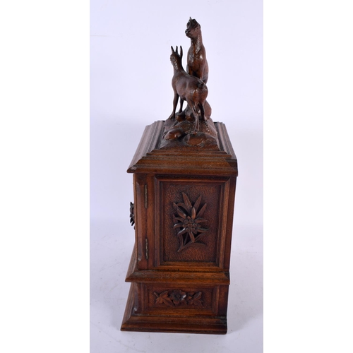 786 - A LARGE 19TH CENTURY BAVARIAN BLACK FOREST CARVED WOOD JEWELLERY CABINET formed with two ibex. 40 cm... 