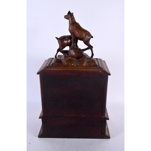 786 - A LARGE 19TH CENTURY BAVARIAN BLACK FOREST CARVED WOOD JEWELLERY CABINET formed with two ibex. 40 cm... 