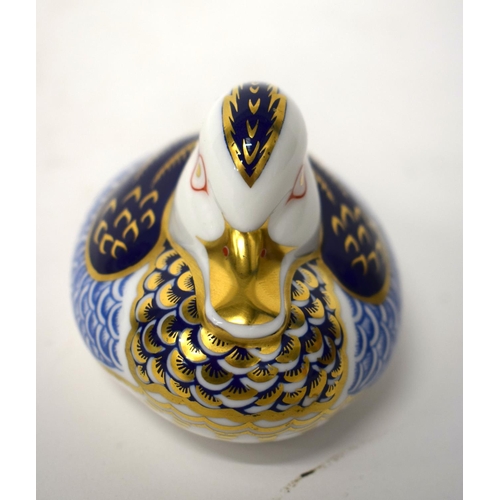 788 - A ROYAL CROWN DERBY DUCK PAPERWEIGHT together with a signed art glass dog dish. 14cm wide. (2)