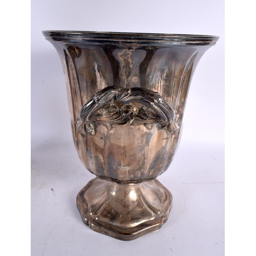 792 - AN EARLY 20TH CENTURY CONTINENTAL SILVER PLATED WINE COOLER together with a painted spelter Grand to... 