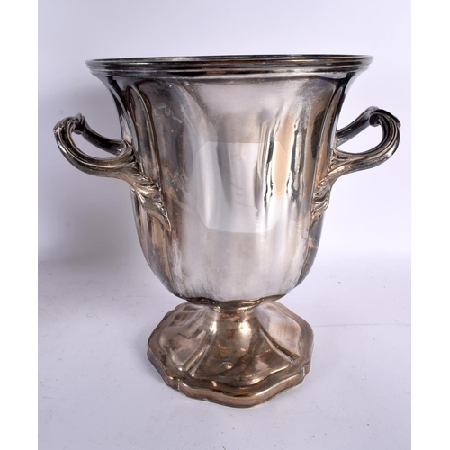 792 - AN EARLY 20TH CENTURY CONTINENTAL SILVER PLATED WINE COOLER together with a painted spelter Grand to... 