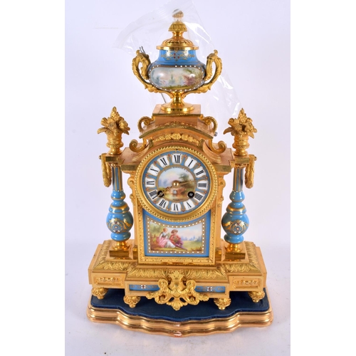 796 - A LARGE 19TH CENTURY FRENCH ORMOLU AND SEVRES PORCELAIN MANTEL CLOCK painted with lovers in landscap... 