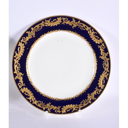 7 - AN ANTIQUE SPODE JEWELLED PLATE together with a similar Minton plate. 25 cm diameter. (2)