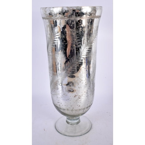 79 - AN ANTIQUE MERCURY STORM GLASS VASE decorated with foliage. 40 cm high.