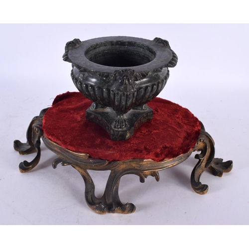 805 - A 19TH CENTURY GRAND TOUR CARVED SERPENTINE INCENSE BURNER modelled upon a bronze scrolling base. 24... 