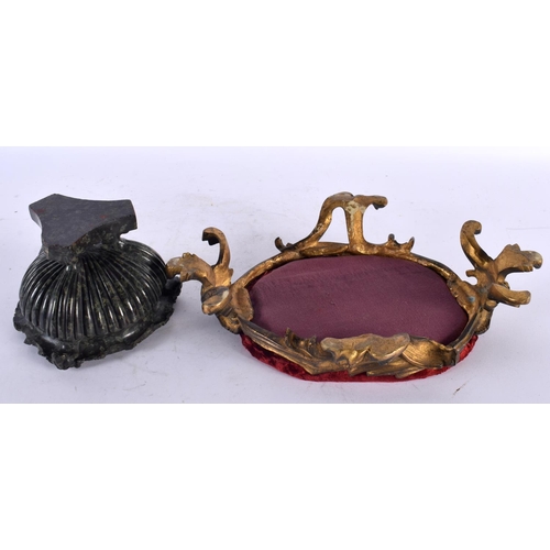 805 - A 19TH CENTURY GRAND TOUR CARVED SERPENTINE INCENSE BURNER modelled upon a bronze scrolling base. 24... 