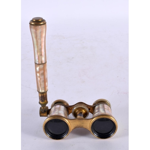 807 - AN UNUSUAL PAIR OF MOTHER OF PEARL OPERA GLASSES. 15cm x 9 cm.