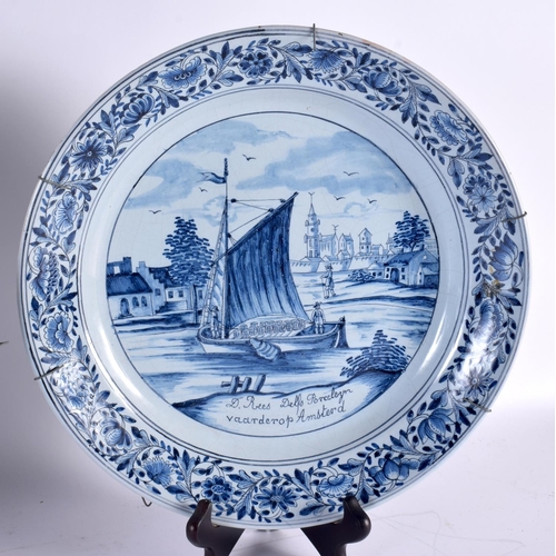 812 - THREE LARGE ANTIQUE DELFT BLUE AND WHITE TIN GLAZED PLATES. 30cm diameter. (3)