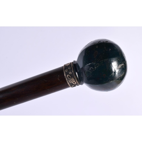 823 - AN ANTIQUE CONTINENTAL BLOODSTONE WALKING CANE. 90cm long.