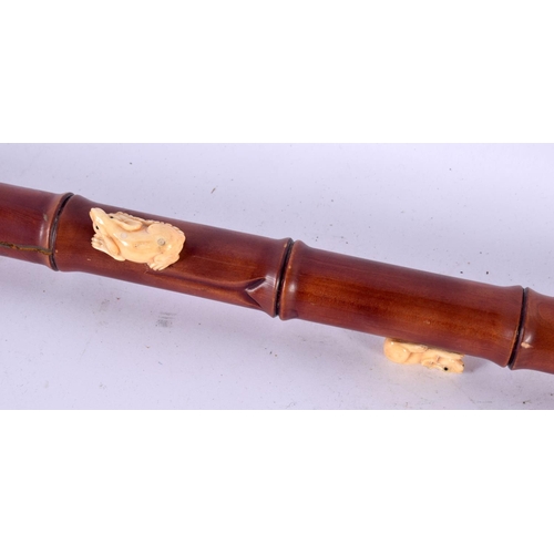 825 - A JAPANESE CARVED WOOD BONE AND WOOD RAT WALKING CANE. 90cm long.