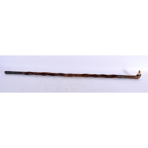 827 - AN ANTIQUE CARVED WOOD AND BONE PARROT WALKING CANE. 80 cm long.