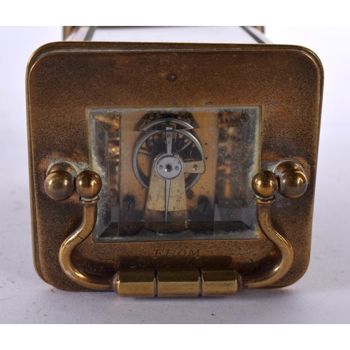 829 - A MINIATURE ANTIQUE CARRIAGE CLOCK. 9.5 cm high inc handle.