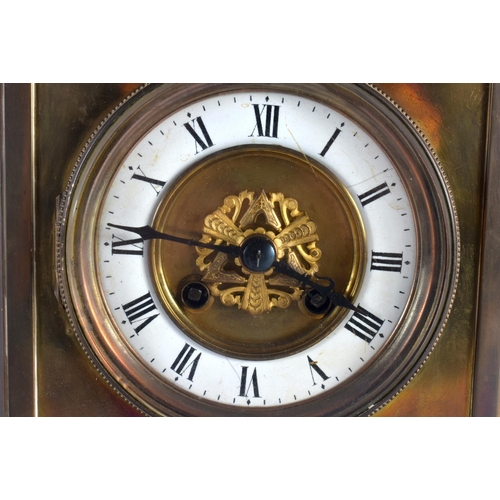 830 - A LATE 19TH CENTURY BRASS MANTEL CLOCK with openwork dial. 32 cm x 15cm.