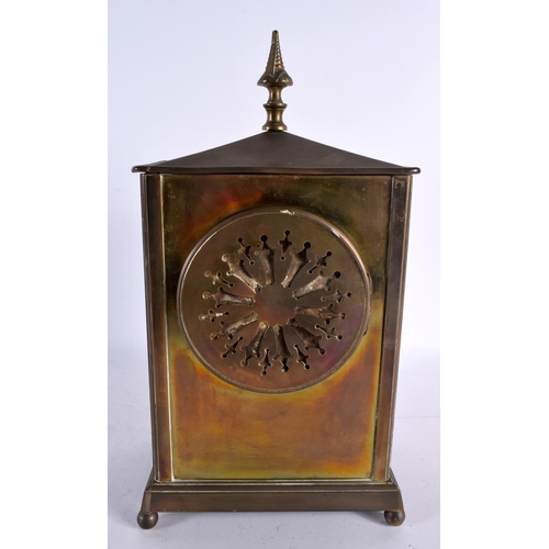 830 - A LATE 19TH CENTURY BRASS MANTEL CLOCK with openwork dial. 32 cm x 15cm.