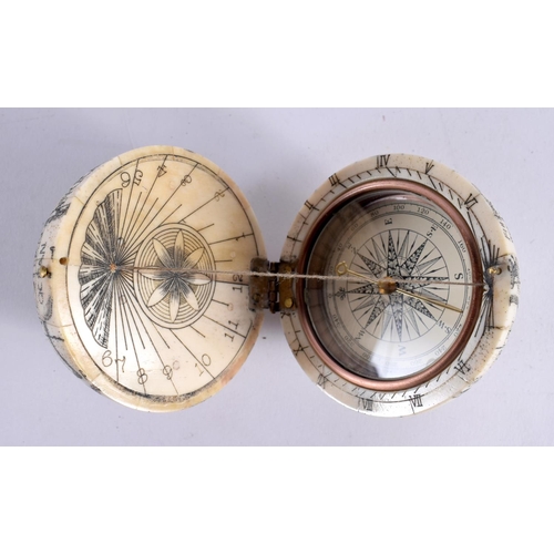 838 - A CONTINENTAL BONE GLOBE COMPASS. 7cm diameter.