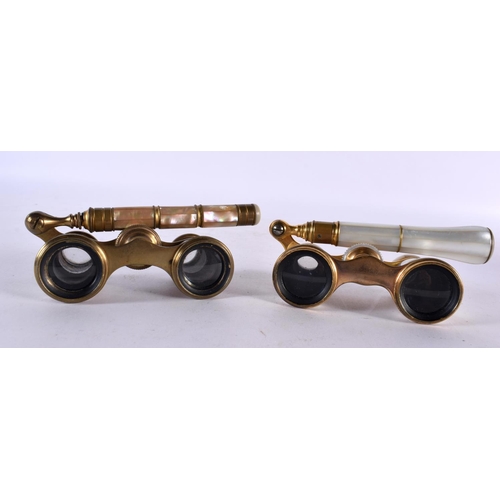 846 - TWO PAIRS OF ANTIQUE MOTHER OF PEARL OPERA GLASSES. Largest 20cm long extended. (2)