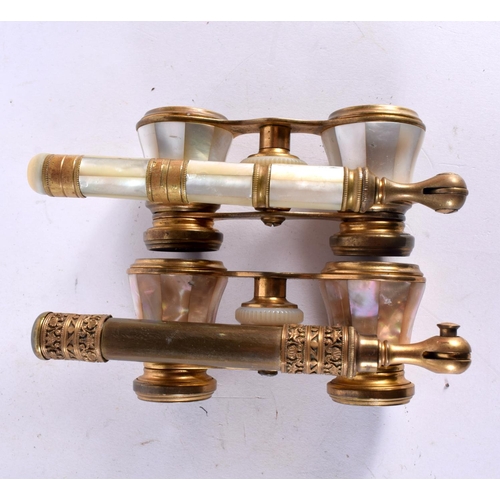 848 - TWO PAIRS OF ANTIQUE MOTHER OF PEARL OPERA GLASSES. Largest 20cm long extended. (2)