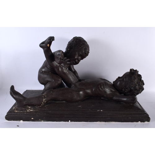 852 - AN ART DECO PLASTER MAQUETTE depicting two grappling nude children. 70 cm x 38 cm.