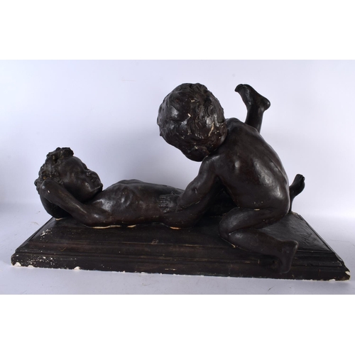 852 - AN ART DECO PLASTER MAQUETTE depicting two grappling nude children. 70 cm x 38 cm.