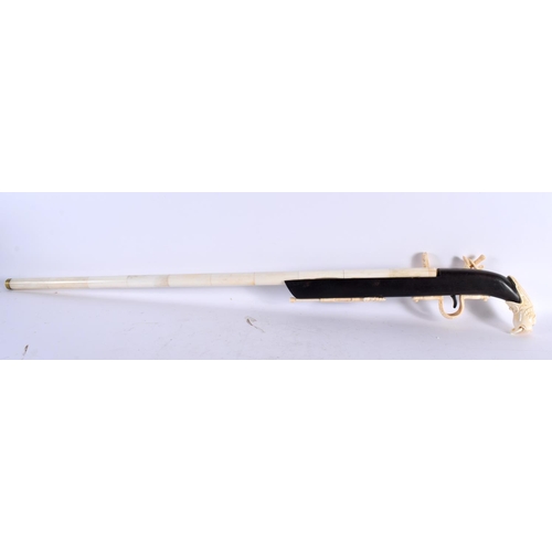 862 - A CONTINENTAL BONE GUN. 90cm long.