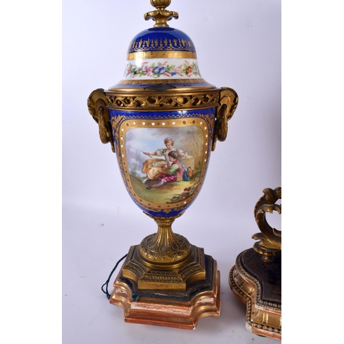 863 - A LARGE 19TH CENTURY FRENCH SEVRES PORCELAIN CLOCK GARNITURE painted with figures within landscapes ... 