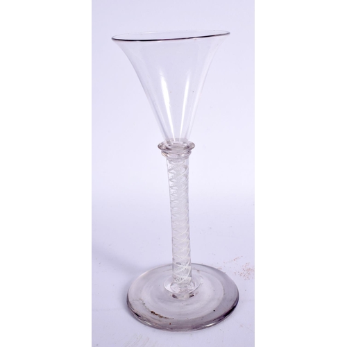 868 - AN ANTIQUE WINE GLASS. 15.5 cm high.