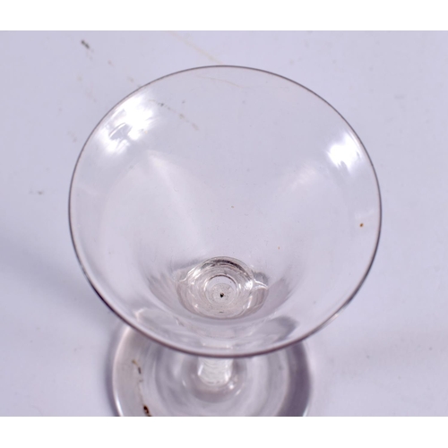 868 - AN ANTIQUE WINE GLASS. 15.5 cm high.