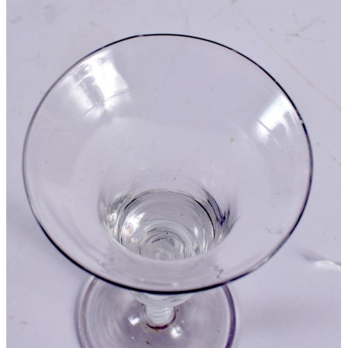 873 - AN ANTIQUE WINE GLASS. 17.5 cm high.