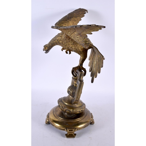 875 - AN ANTIQUE BRONZE EAGLE possibly a watch holder. 36 cm x 22cm.