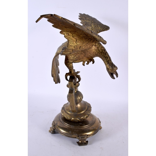 875 - AN ANTIQUE BRONZE EAGLE possibly a watch holder. 36 cm x 22cm.