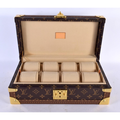 877 - A LOUIS VUITTON LEATHER WATCH BOX. 34 cm x 18cm x 12 cm.