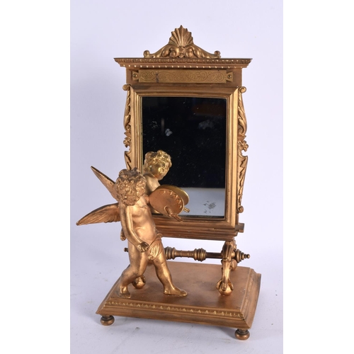 888 - AN EARLY 20TH CENTURY FRENCH BRONZE MIRRORED CHERUB FIGURE. 23 cm x 15cm.