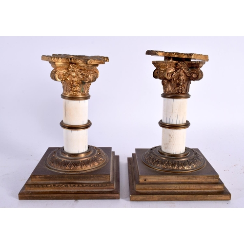 892 - A SMALL PAIR OF EARLY VICTORIAN COUNTRY HOUSE DWARF CANDLESTICKS. 11cm x 5 cm.