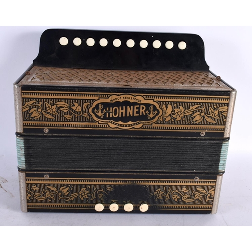 896 - A HOHNER ACCORDION. 27 cm x 27 cm.